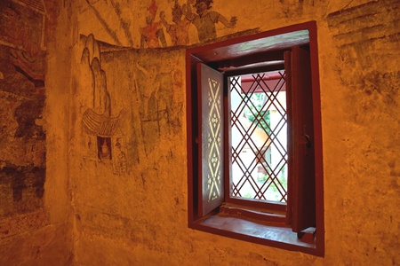 Ancient mural painting on the wall of main hall of Wat Phumin, a famous temple in Nan province, Thailand.の写真素材