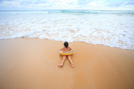  girl on sandy beach の写真素材