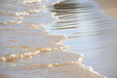 Wave of water on  beach 