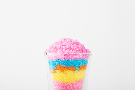 Sugar in glass on white blackgroudの写真素材