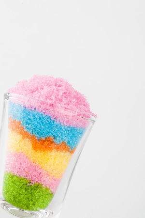 Sugar in glass on white blackgroudの写真素材
