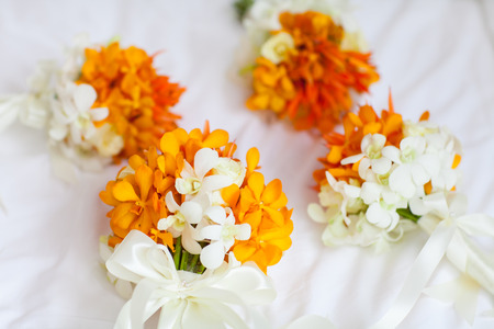 Floral arrangement at a wedding ceremony on the beach.の写真素材