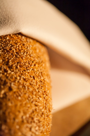 Sliced bread on cutting board closeupの写真素材