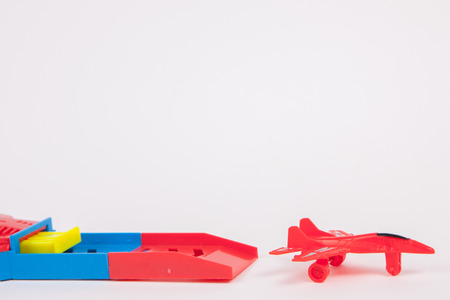 Toy Plane on White paper Backgroundの写真素材
