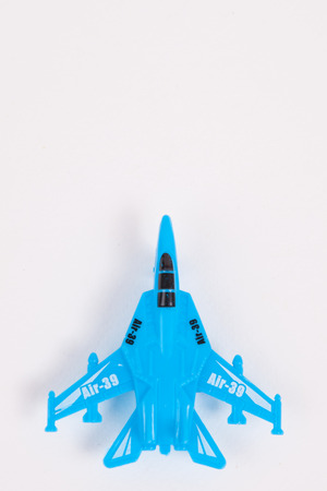 Toy Plane on White paper Backgroundの写真素材