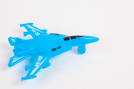 Toy Plane on White paper Backgroundの写真素材