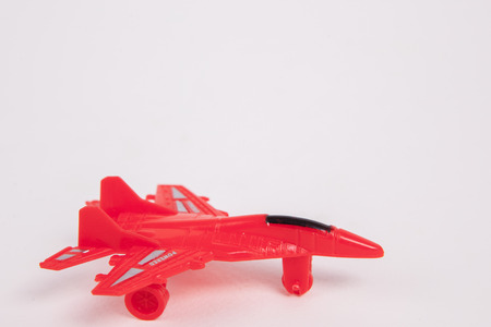 Toy Plane on White paper Backgroundの写真素材