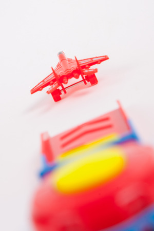 Toy Plane on White paper Backgroundの写真素材