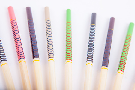 chopsticks on a white paper backgroundの写真素材