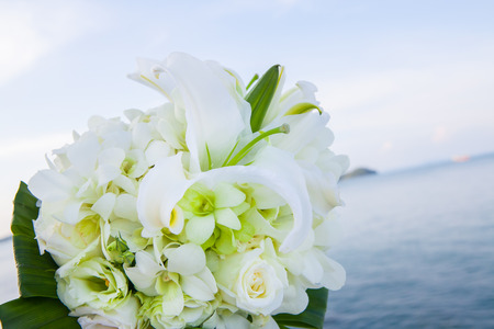 closeup of beautiful wedding decorated on beach wedding setupの写真素材