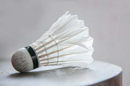 Closeup Old shuttle cock on dirty tableの写真素材