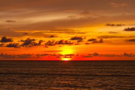 Sunset on the beach with beautiful skyの写真素材