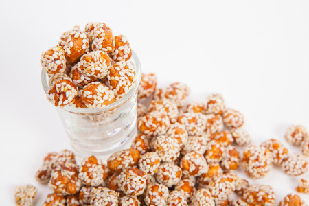 Roasted peanuts coated with sugar and sesame.の写真素材