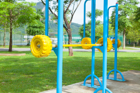 Exercise equipment in public park in the morning at Thailand