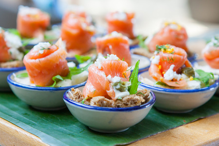 canapes with smoked salmon set for wedding party.の写真素材