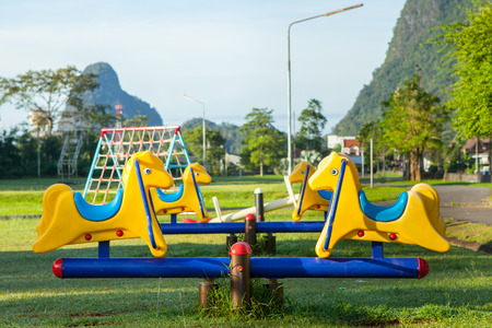 Children playground park in The morning at Thailand.の写真素材