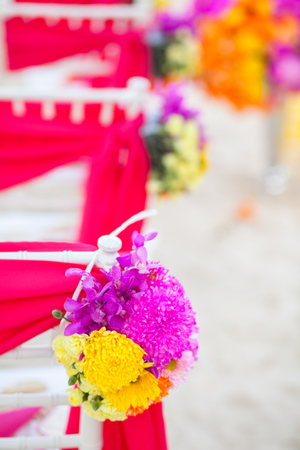 Floral arrangement at a wedding ceremony on beach.の写真素材