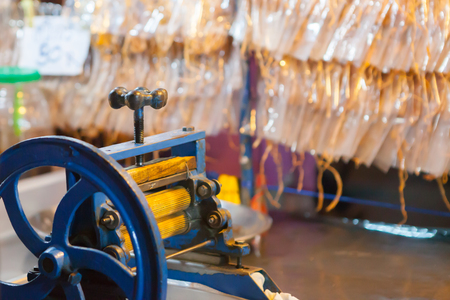 grilled dried squid on night market ,Thailandの写真素材