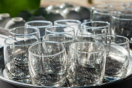 Empty glasses composition on table before celebration at outdoorの写真素材