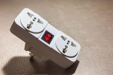 Electrical socket plug adapter put on the  table  background .の写真素材