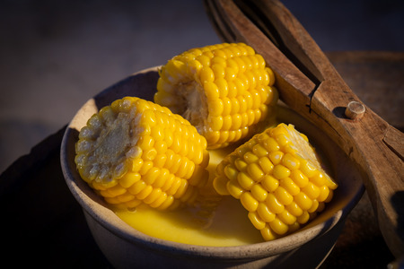 steamed corn in bowl  on buffet line for dinner party.の写真素材