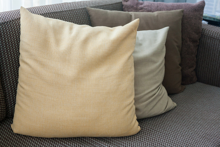 Sofa with pillows in room at home.の写真素材
