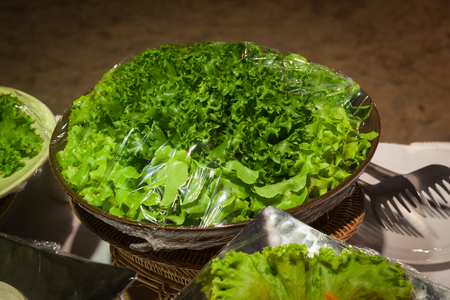 Vegetable salad on plastic wrap for buffet line in wedding party.の写真素材