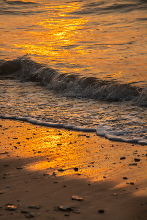 Beautiful sunset and sea wave in the sea. Thailand.の写真素材