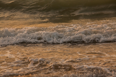 Beautiful sunset and sea wave in the sea. Thailand.