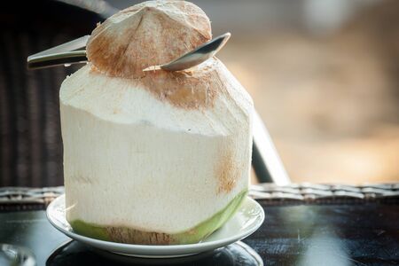 Coconut water is placed on the table and refreshment.
