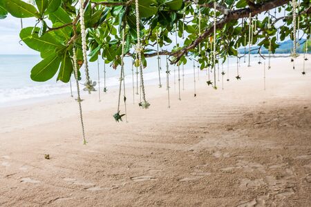 Floral arrangement at a wedding ceremony on beach.の写真素材