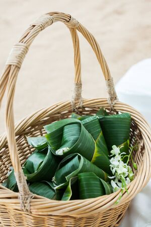 Lotus petals in banana leaf for the newlyweds at the wedding.の写真素材