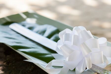 Knife prepared for cutting cake in wedding celebration.の写真素材