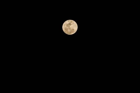 Full moon on the dark night in Thailand.の写真素材