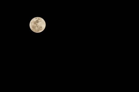 Full moon on the dark night in Thailand.の写真素材