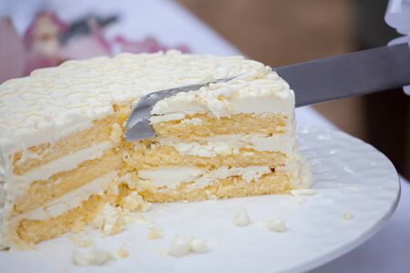 The wedding cake is cut into pieces.の写真素材