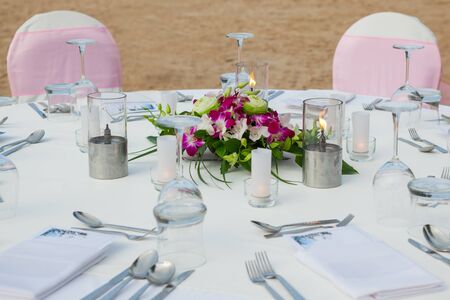 Set the table for dinner on the beach.の写真素材