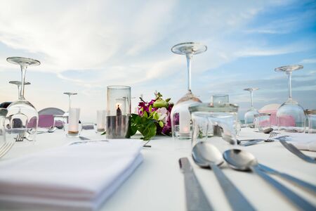 Set the table for dinner on the beach.の写真素材