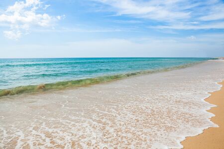 Wave of the sea on the sand beach at Thailand.の写真素材