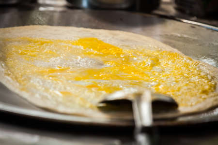 Fried roti with egg and banana,Thailandの写真素材