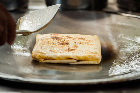 Fried roti with egg and banana,Thailandの写真素材