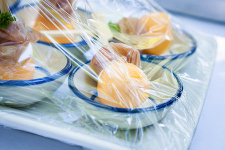 Canape ; Decoration and foods that are wrapped with plastic wrap prepared for the weddingの写真素材