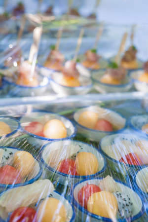 Canape ; Decoration and foods that are wrapped with plastic wrap prepared for the weddingの写真素材