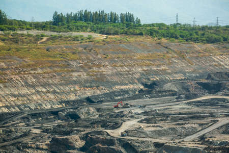 Mining dump trucks working in coalmine , Used as a source of electricity generation in the country.の写真素材