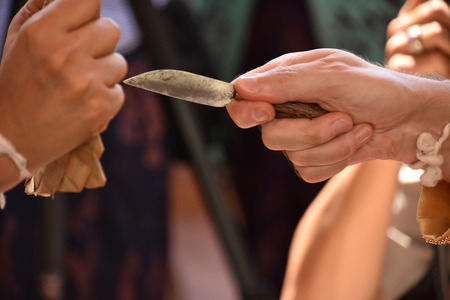 The ceremony with the knife performed during a traditional Balinese wedding
