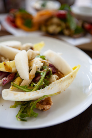 Delicious and healthy Raw Food: Insalata di Indivia. Endive salad with gorgonzola, pear, walnuts and mustard dressing. Natural light.の写真素材
