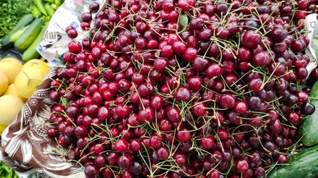 Red, ripen and juicy fresh cherries. Rich in Nutrients. Good source of vitamin, antioxidants and anti-inflammatory compounds. Helps lower the risk of heart disease. Healthy eating and eat well conceptの写真素材