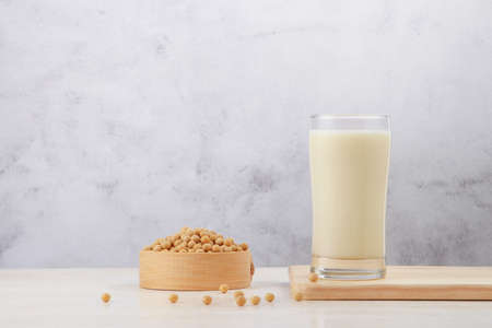 Soy milk and soybeans on the table