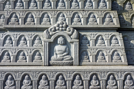 pagoda with thousand stone carved buddhasの写真素材