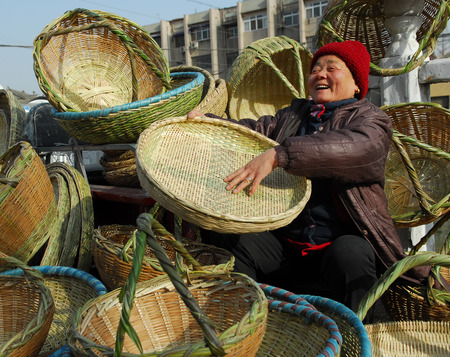 a hawker selling bamboo productsのeditorial素材